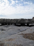 SX14007 Rock slab elevated on big pebbles.jpg